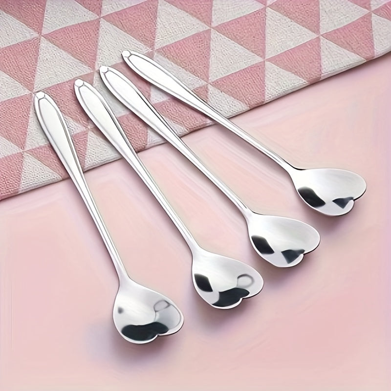 Celebrate love with 2 stainless steel coffee spoons shaped like hearts, the perfect gift for Valentine's Day. These creative spoons are perfect for stirring desserts and are ideal for Christmas parties, holidays, restaurants, and home use.