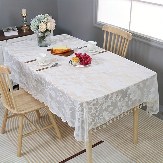 Elegant modernist lace embroidered tablecloth with tassel for weddings, parties, and home decor.