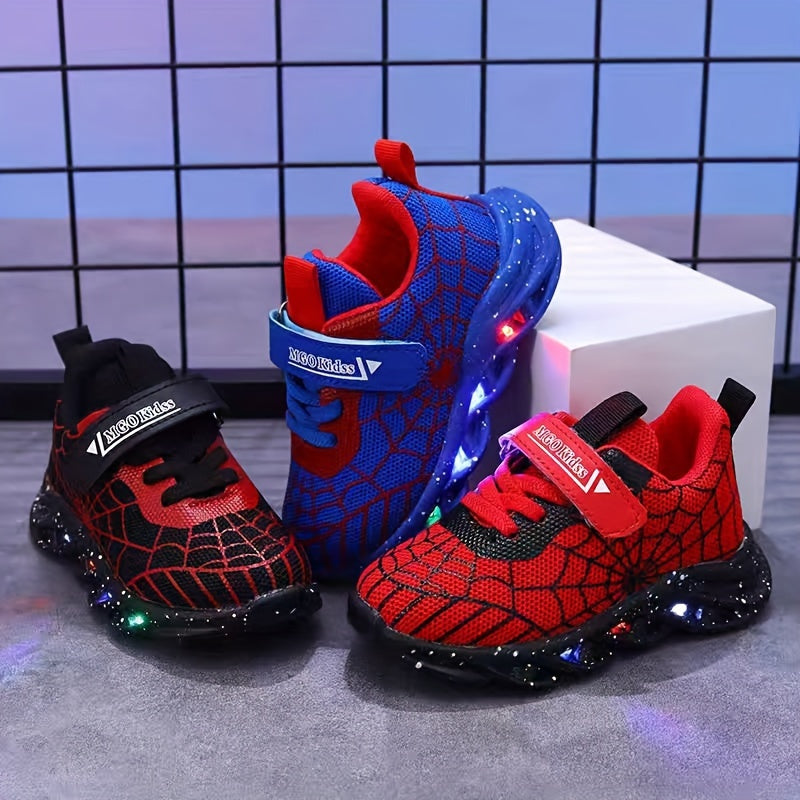 Durable rubber-soled boys' LED sneakers in red and blue with spider web design, breathable mesh, and hook-and-loop closure for casual wear and playtime.