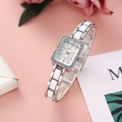 Chic square crystal luxury women's watch with minimalist design, quartz movement, zinc alloy strap, ideal Ramadan gift.