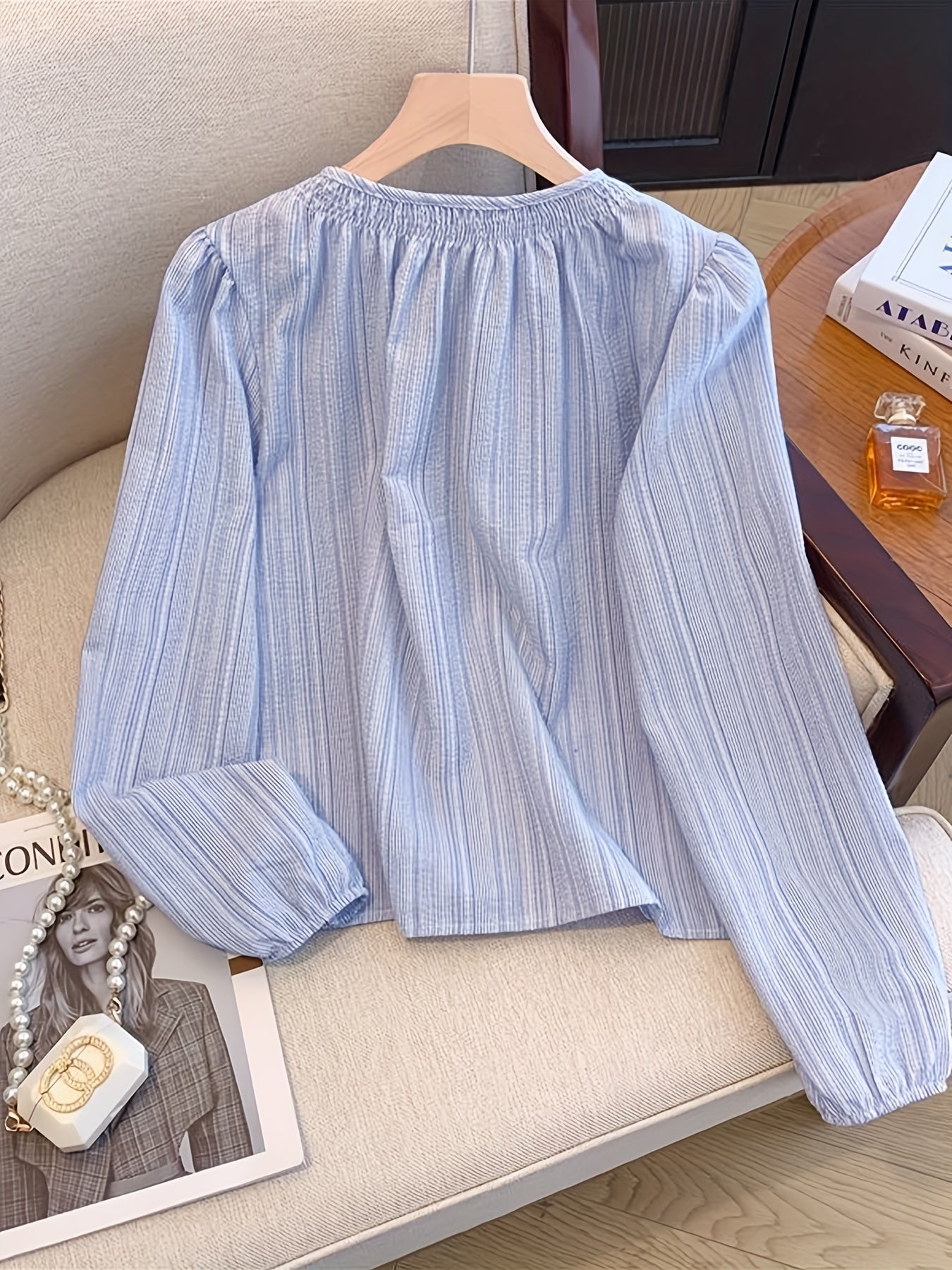 Vintage Striped Long Sleeve Blouse for Women in Light Blue with Ruffled Cuff and Button-Up Half Placket. Made from Polyester with a Flowing Fit, Perfect for Spring/Fall. Japanese-inspired