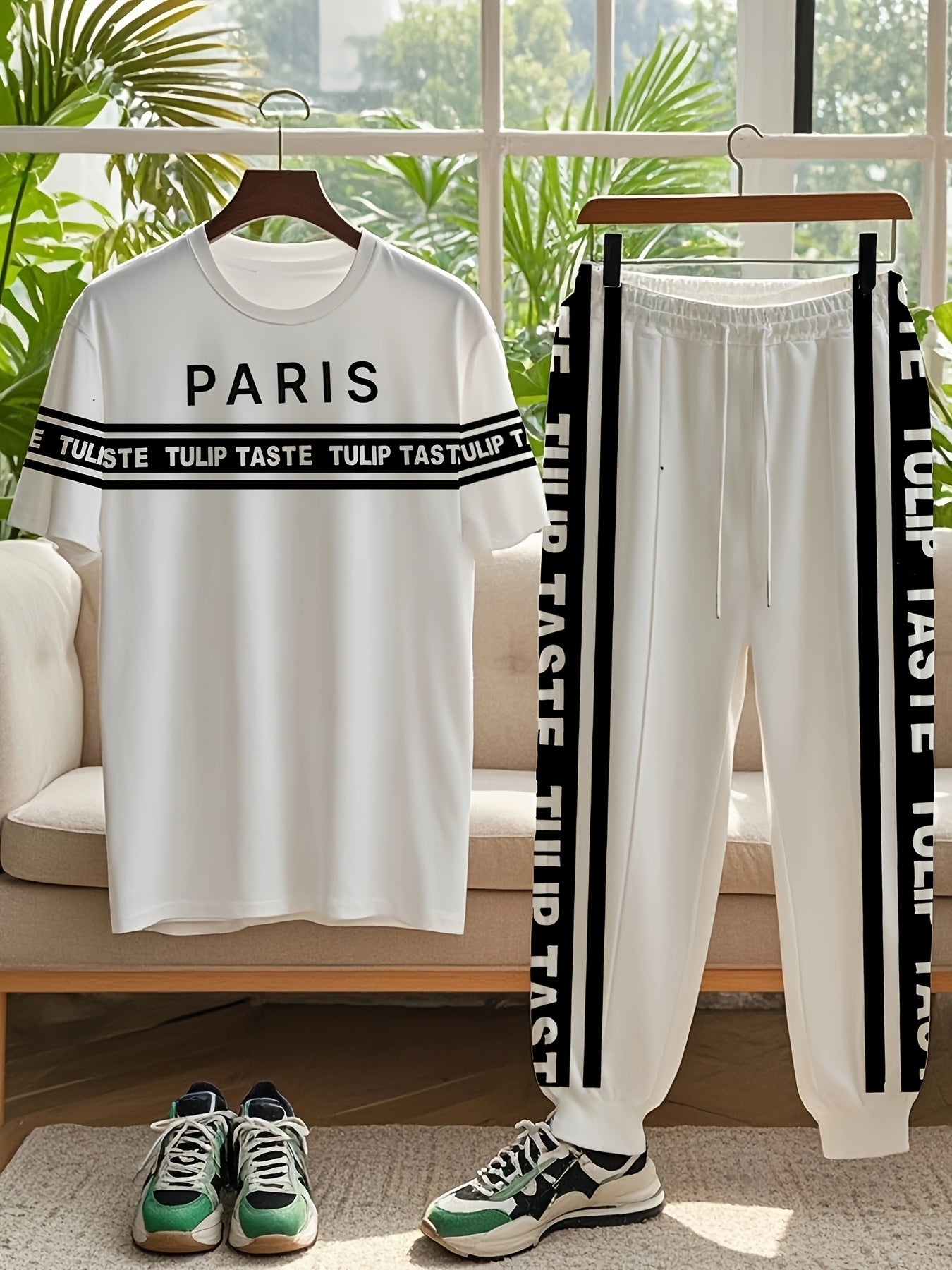 Plus size urban style black and white striped men's t-shirt and pants set featuring mixed print Paris letter street culture design, perfect for trendy summer streetwear.