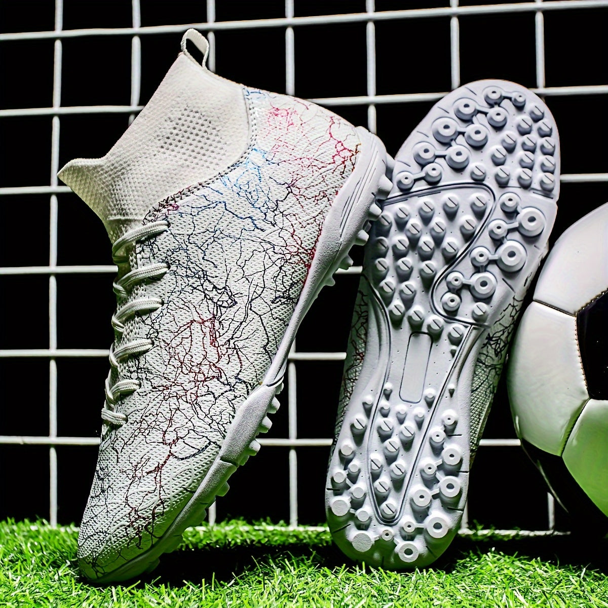 Men's turf soccer cleats with rubber sole and fabric inner material for artificial grass fields.