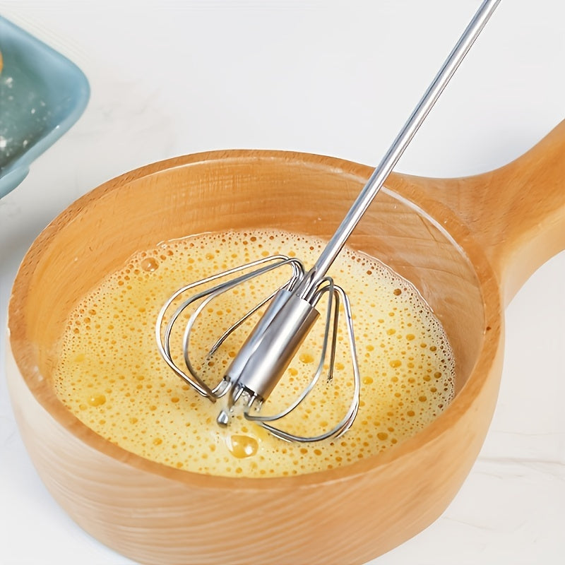 Essential kitchen gadget: Stainless steel whisk and milk frother for baking, eggs, and cream.