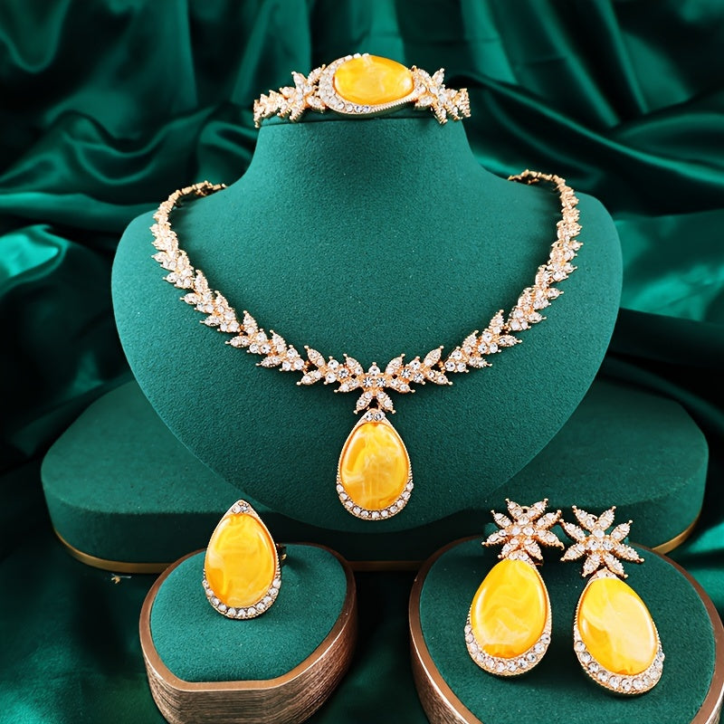 Experience luxury with our 18K Gold Plated Alloy Jewelry Set adorned with sparkling rhinestones. This 4-piece set oozes elegance and is perfect for your vacation outfits. Ideal for weddings, gifts, and Valentine's Day, our Gold Plated Bridal Party Sets