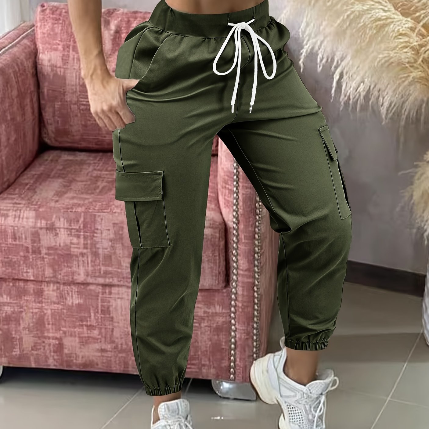 Women's casual cargo pants made of polyester with a drawstring waist.