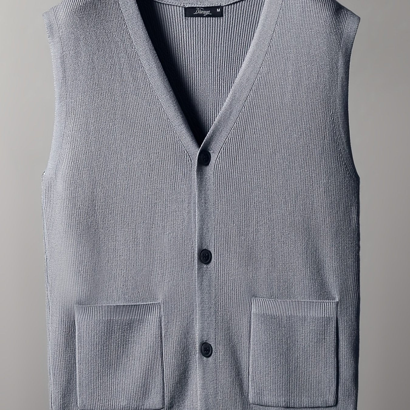 Men's oversized knitted sweater featuring a new cardigan vest design for autumn and winter.