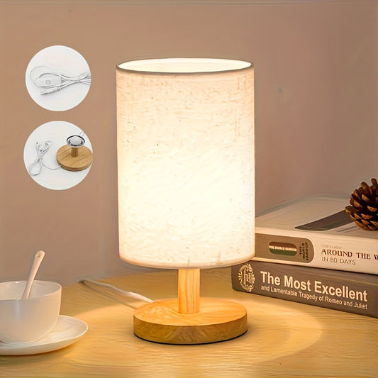 Modern solid wood table lamp with creative LED light, ideal for bedroom, study room, and guest house decor. Features natural wooden base.