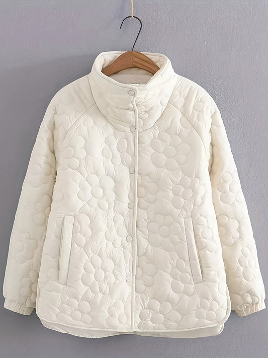 Quilted jacket for plus-size women, featuring embroidered floral pattern and stand collar. Cream-colored, perfect for fall/winter.