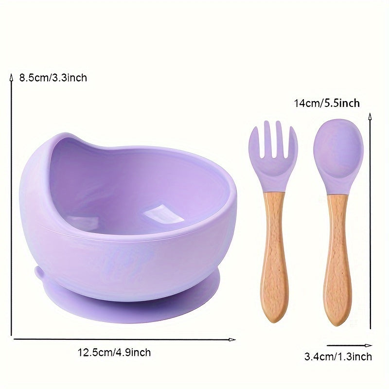 Three pieces of silicone feeding bowl, fork, and spoon set with durable suction bowl. Includes feeding kit with wooden handle, non-slip design, and microwave safe.