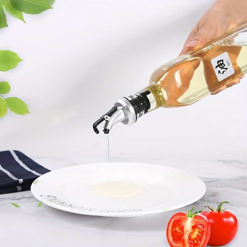 Set of four 500ml glass bottles for olive oil and vinegar, with drip spouts ideal for cooking, baking, and other kitchen tasks. Essential kitchen supplies and tools, perfect for all your kitchen needs.