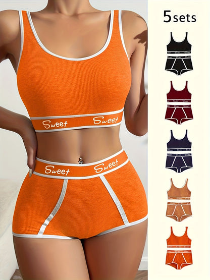 Set of 5 letter print underwear for women, featuring sports bra and boxer briefs in comfortable, soft fabric. Stay stylish and confident every day with this fashionable design.