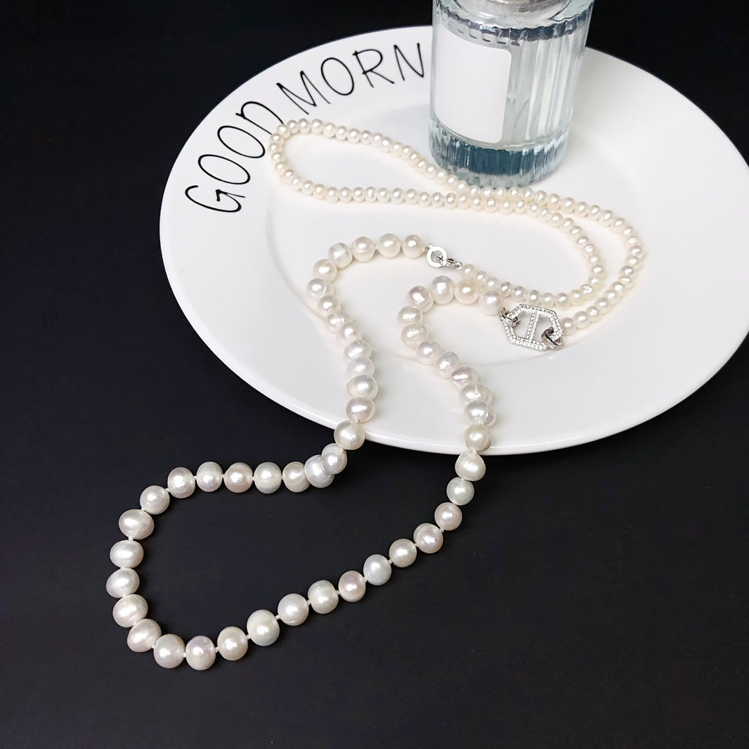 Capture timeless elegance with our luxurious Double Strand Freshwater Pearl Necklace, perfect for both daily wear and special occasions. Packaged in a beautiful gift box, this pure pearl accessory is free of any plating, making it a versatile and stylish