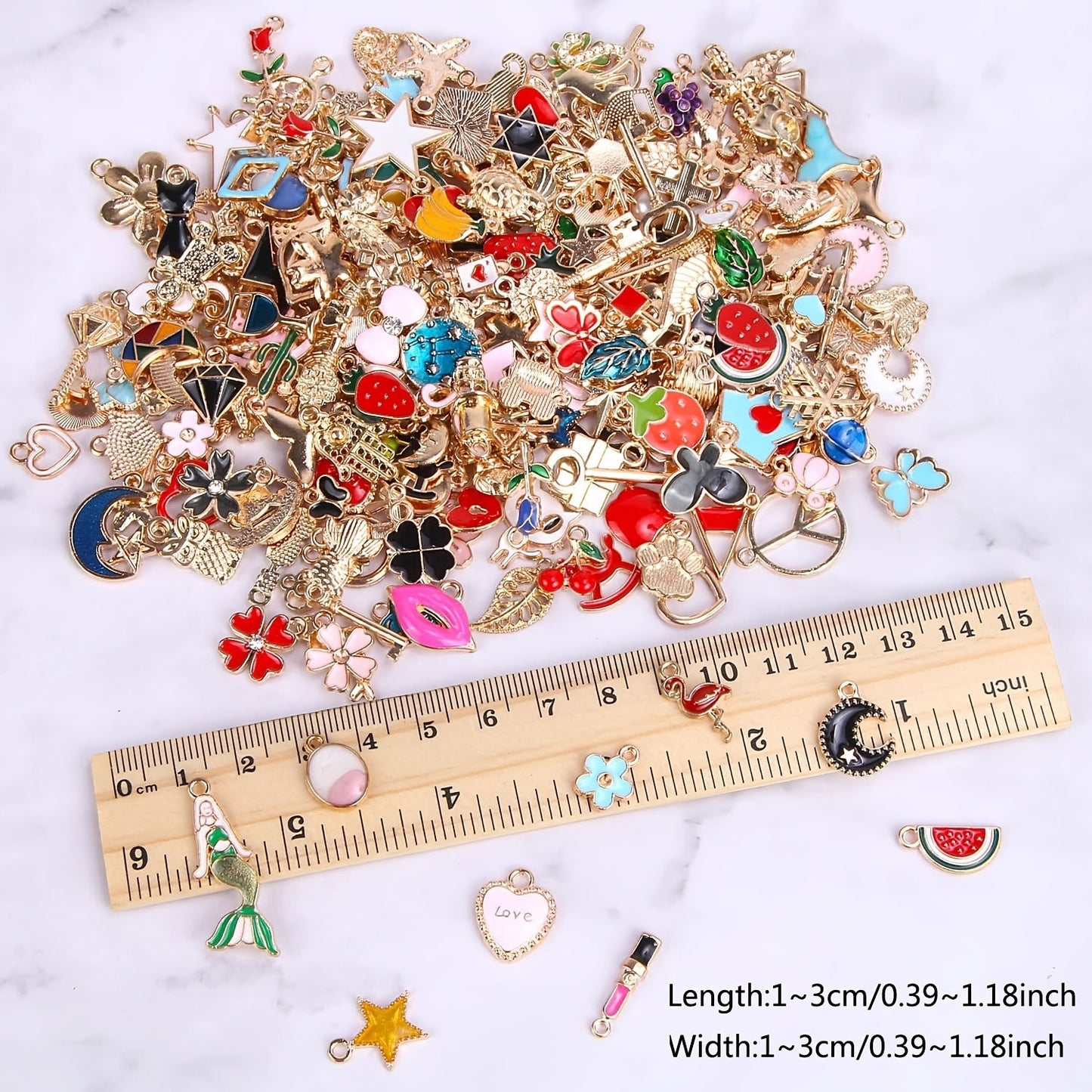 50 pieces of assorted golden enamel plated charms made of zinc alloy, perfect for DIY jewelry making to create pendants for necklaces, bracelets, earrings, and fabric accessories. Craft supplies included.