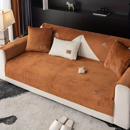 Luxurious plush sofa cover with label, thick and warm for winter. Pet-friendly, non-slip, modern design for living room, bedroom, or office decor.