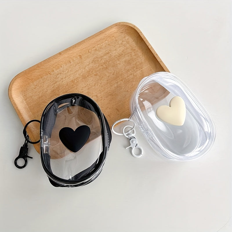 Waterproof heart-shaped PVC bag with keychain for organizing cables and headphones.