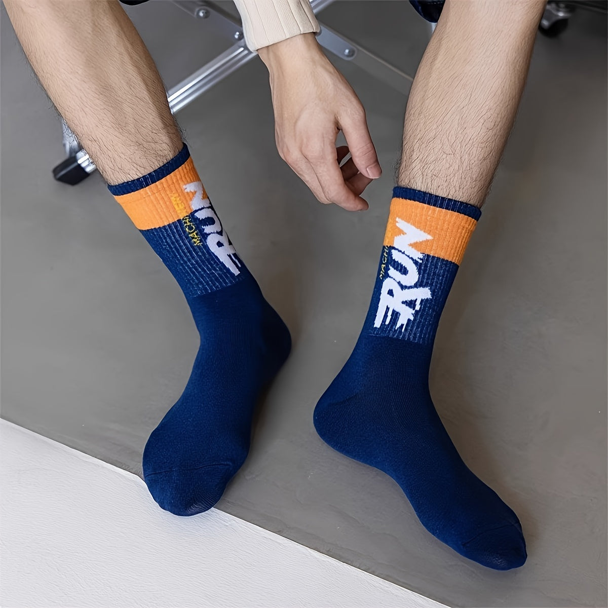 Men's mid-calf crew socks with 5 pair letter pattern, perfect for outdoor sports.