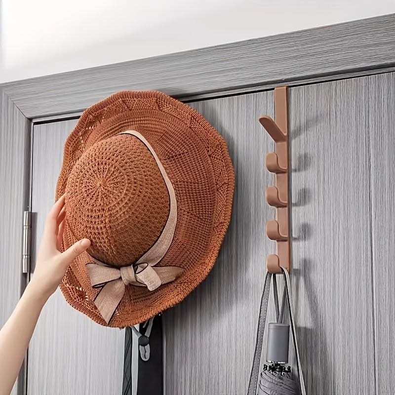 Simple, no-drill over-the-door hook for clothes and hats, with strong adhesive and space-saving design.