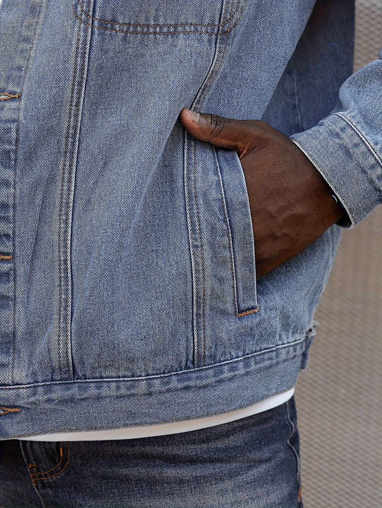 Plus size men's washed denim jacket with classic fit made from cotton fabric.