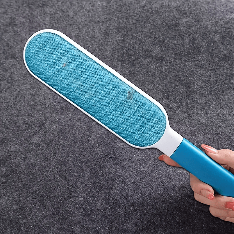 Introducing the versatile and eco-friendly Dust Brush - perfect for removing pet hair, lint, and keeping your clothes, sofas, furniture, bedding, and carpets clean. An essential tool for every living room!