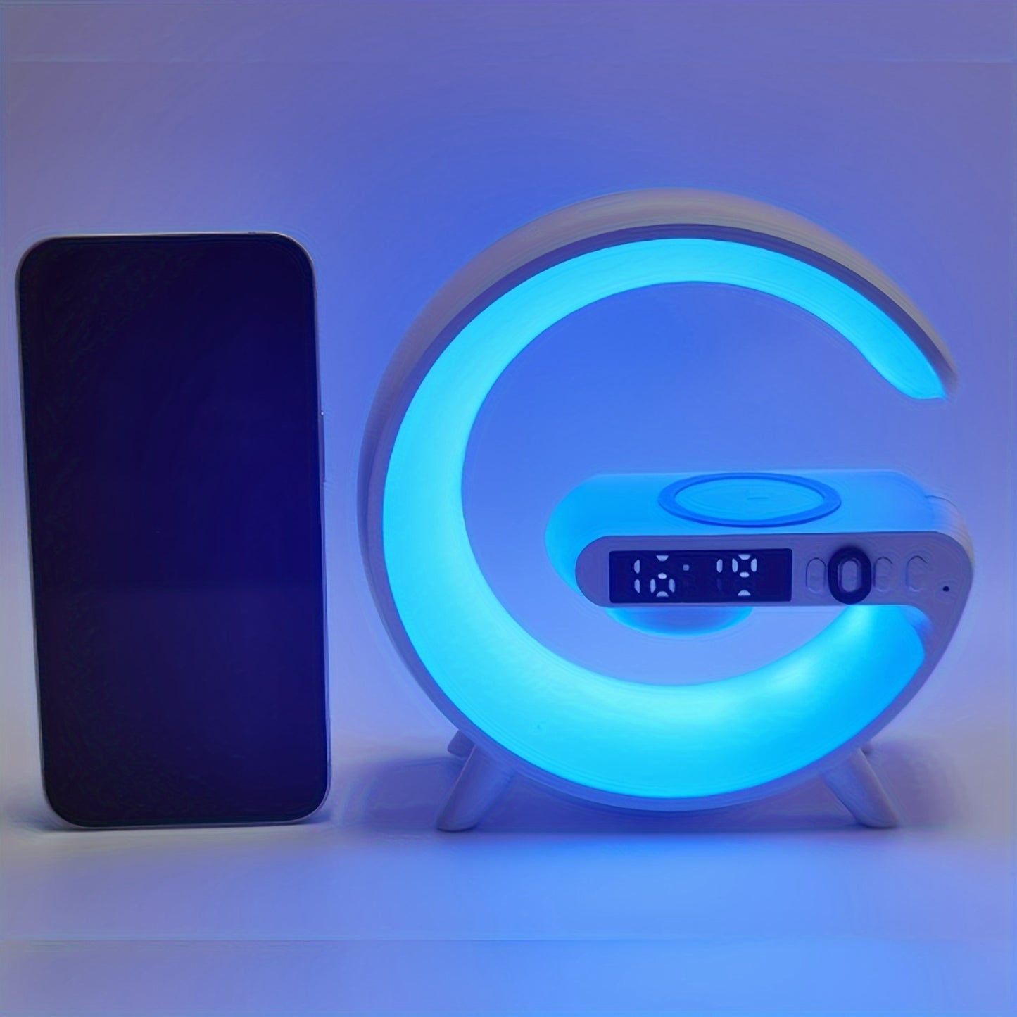 Kouzone Wireless Speaker with Ambient Light, Wireless Charging Pad, and Music Sync for smartphones.