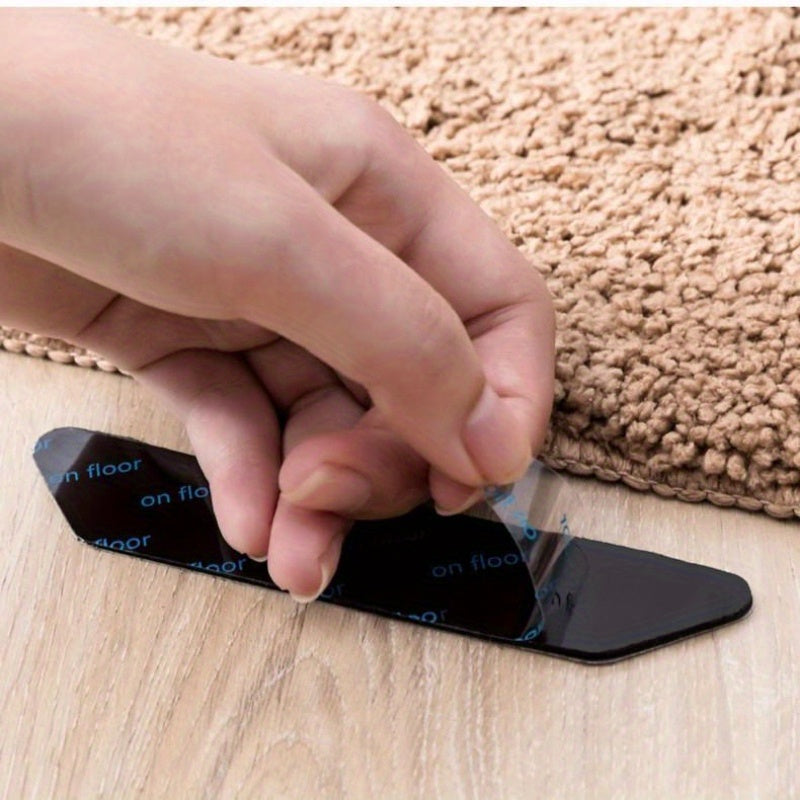 8 pieces of PPSU non-slip carpet gripper pads with double-sided PU adhesive that are washable and invisible. These fixation stickers are perfect for preventing rugs from moving in entryways, rooms, and bedrooms. Ideal for multi-purpose use.