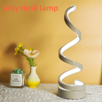 Stylish Spiral LED Desk Lamp - Adjustable brightness, USB-powered, artistic metal design for bedroom, study, or living room - Perfect gift for office or home décor.