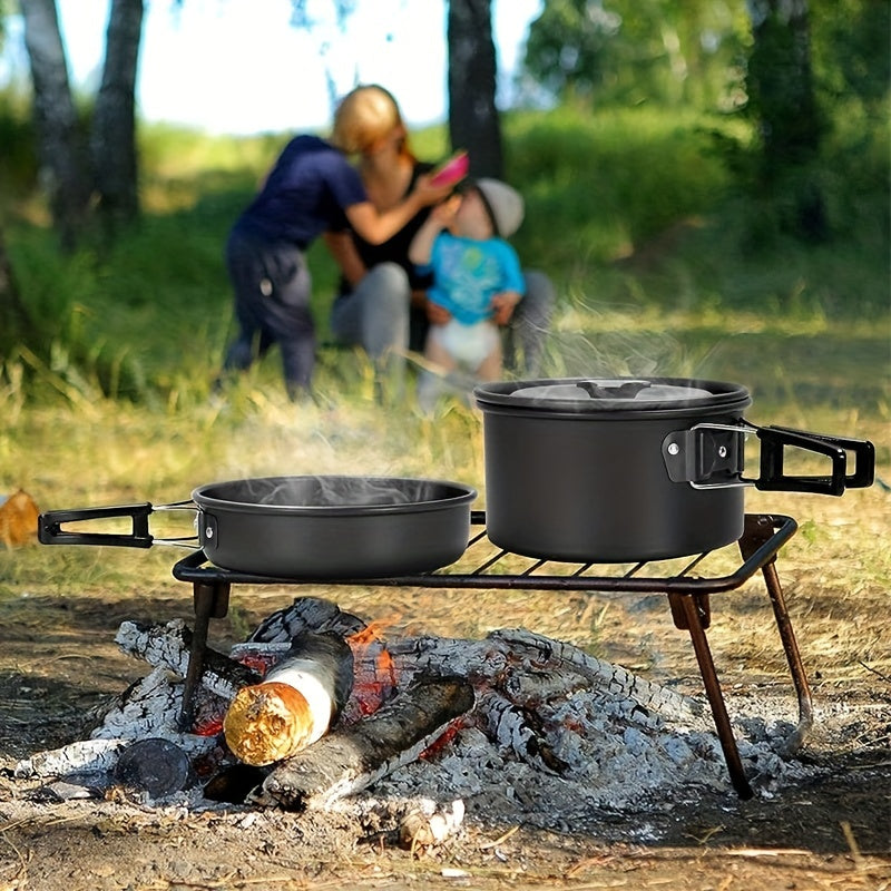 15-piece camping cookware set made of portable non-stick aluminum alloy for outdoor cooking.