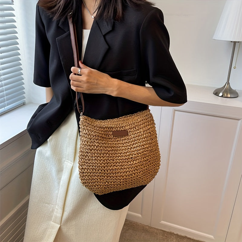 Handmade rattan crossbody bag for women, woven straw shoulder bag for summer.