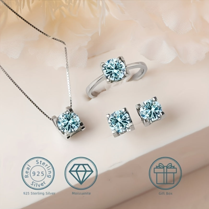 Complete 925 Sterling Silver Moissanite Jewelry Set featuring 1 pair of Earrings, 1 Necklace, and 1 Ring adorned with a 1ct Moissanite stone. High quality pieces ideal for Engagement or Wedding, a perfect Christmas gift complete with Certificate and Box.