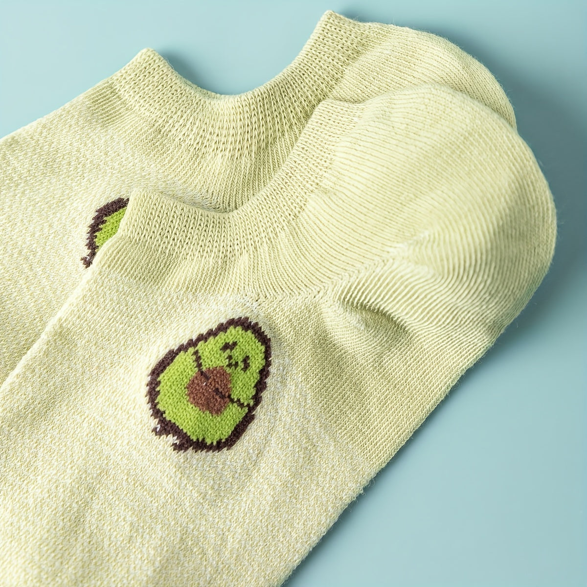 5 pairs of cute and comfy avocado print crew socks for women's ankles.