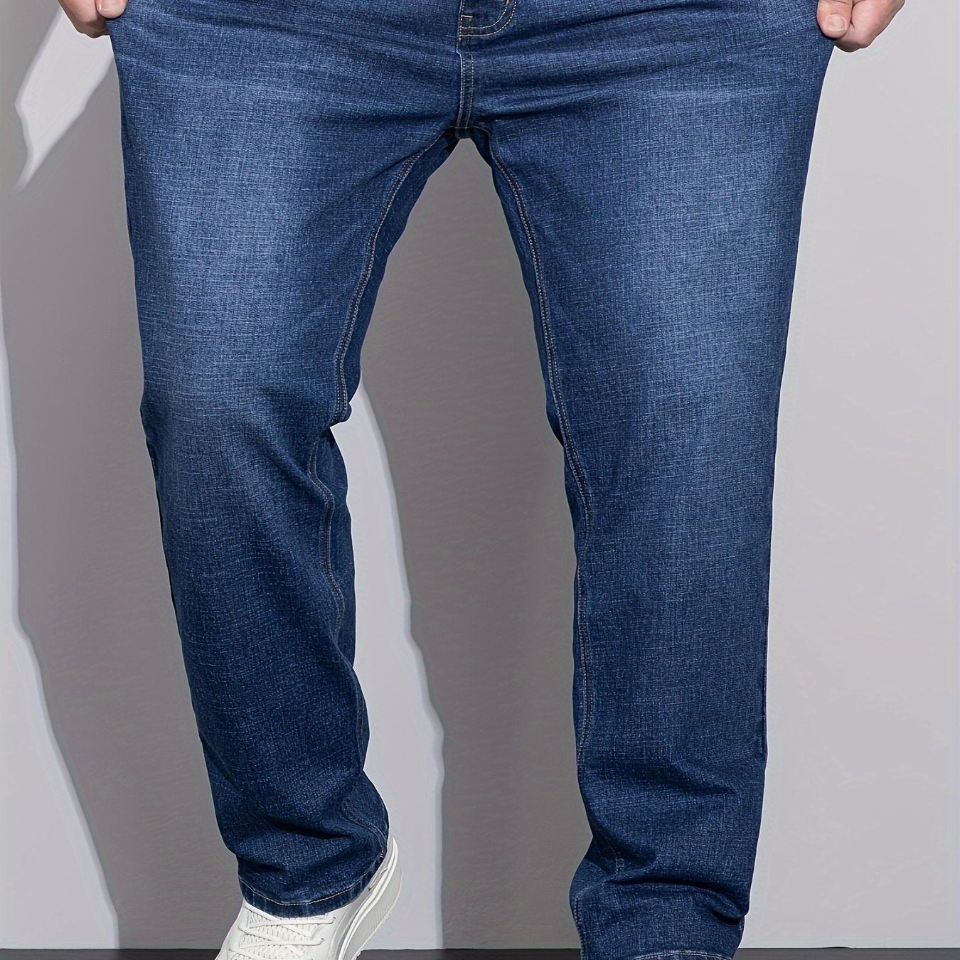 Cotton denim jeans for men in plus sizes, designed for comfort in all seasons with a regular fit.