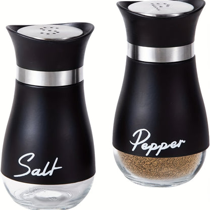 Set of two 3.4oz salt and pepper shakers for kitchen use.