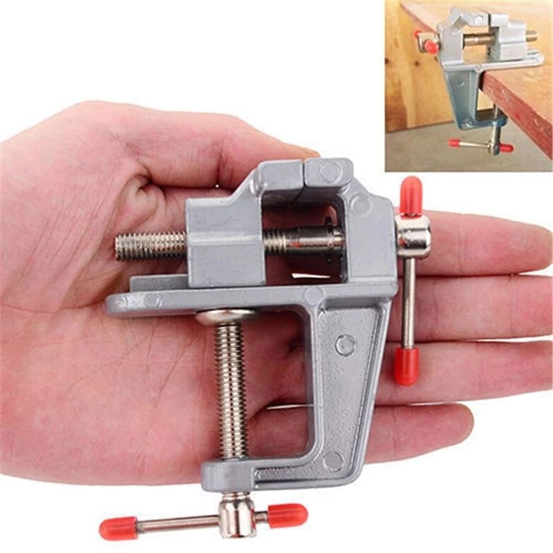 Mini bench vise for DIY projects, woodworking, jewelry making, and crafts. Made of durable metal with rubber grip and precision engineering.