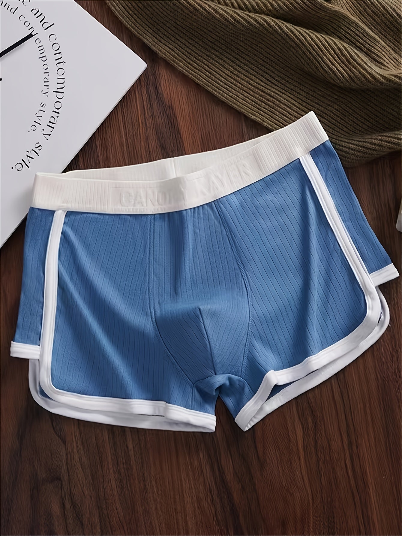 Three men's boxer briefs for comfortable, breathable, and dry sports wear.