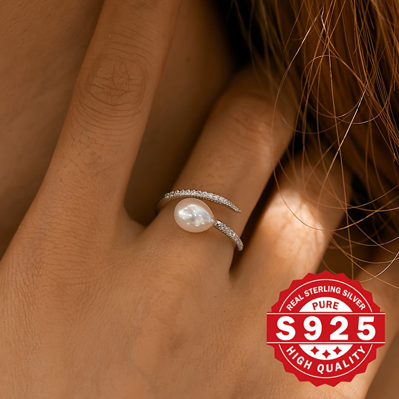 This elegant freshwater pearl ring for women is crafted from S925 sterling silver and adorned with artificial zirconia and freshwater pearls. Its stylish clash design makes it a unique gift option for festivals. Suitable for all occasions, this