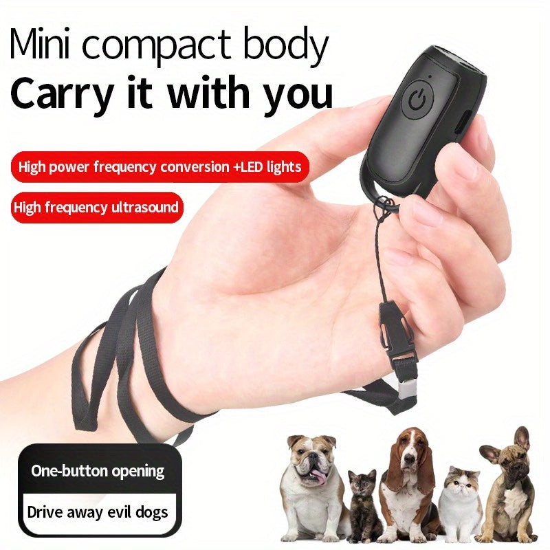 Mini Ultrasonic Dog Repeller with LED light and battery to scare dogs and stop barking.