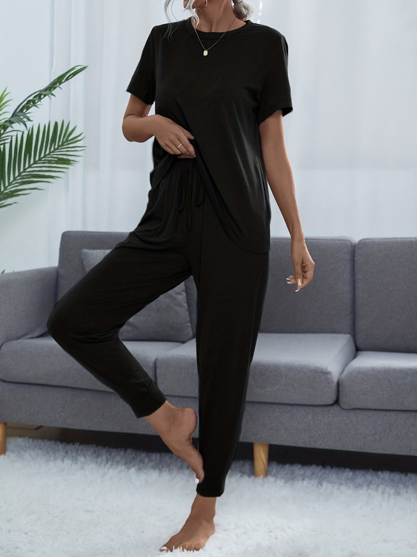 Basic lounge set for women with short sleeve top and elastic waistband pants.