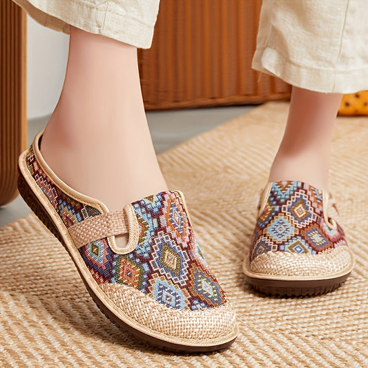 Women's geometric print mules with colorful embroidery and comfortable non-slip sole.