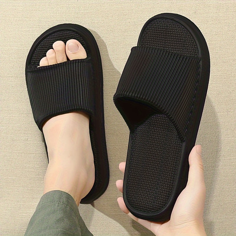 Solid color open toe slippers for men and women, breathable, comfy, non-slip, and durable EVA sole for indoor activities.