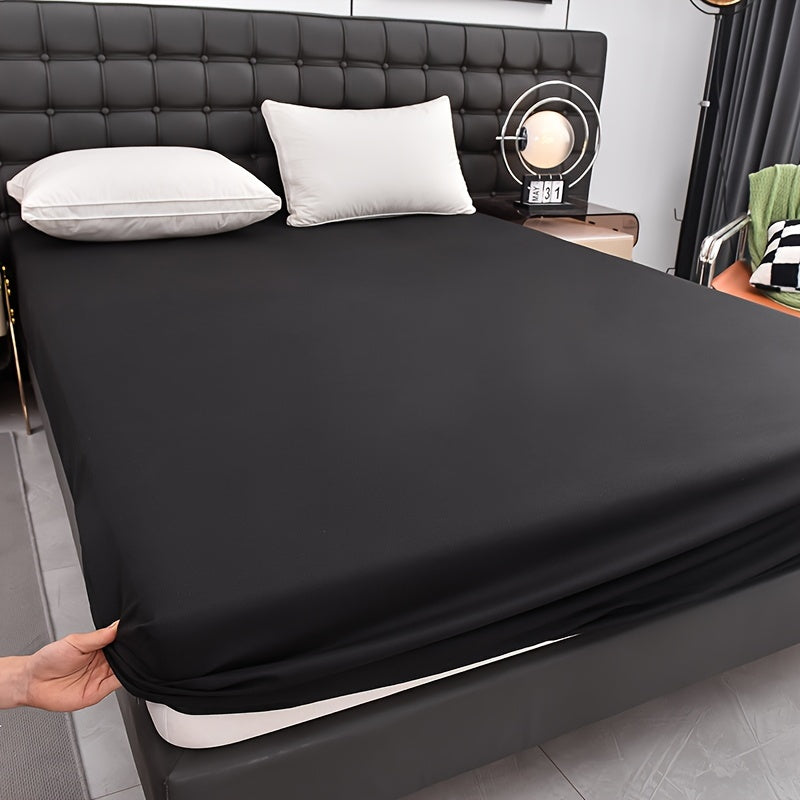 Upgrade your bedding with our Ultra-Soft Waterproof Fitted Sheet in Solid Black. Made with breathable and comfortable material, this sheet features deep pockets for a secure fit. Easy to machine wash, this sheet is perfect for any bedroom, guest room