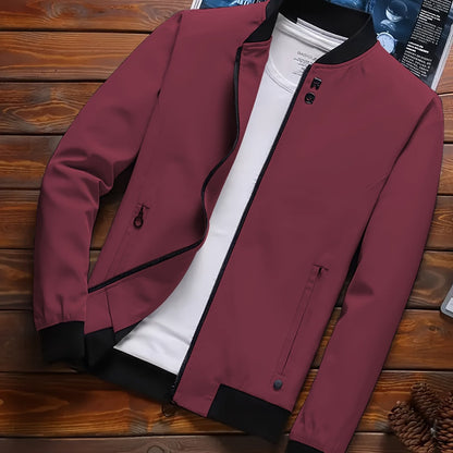 Men's versatile maroon zip-up jacket with stand collar, side pockets | Lightweight polyester blend, ideal for spring and autumn outdoor activities