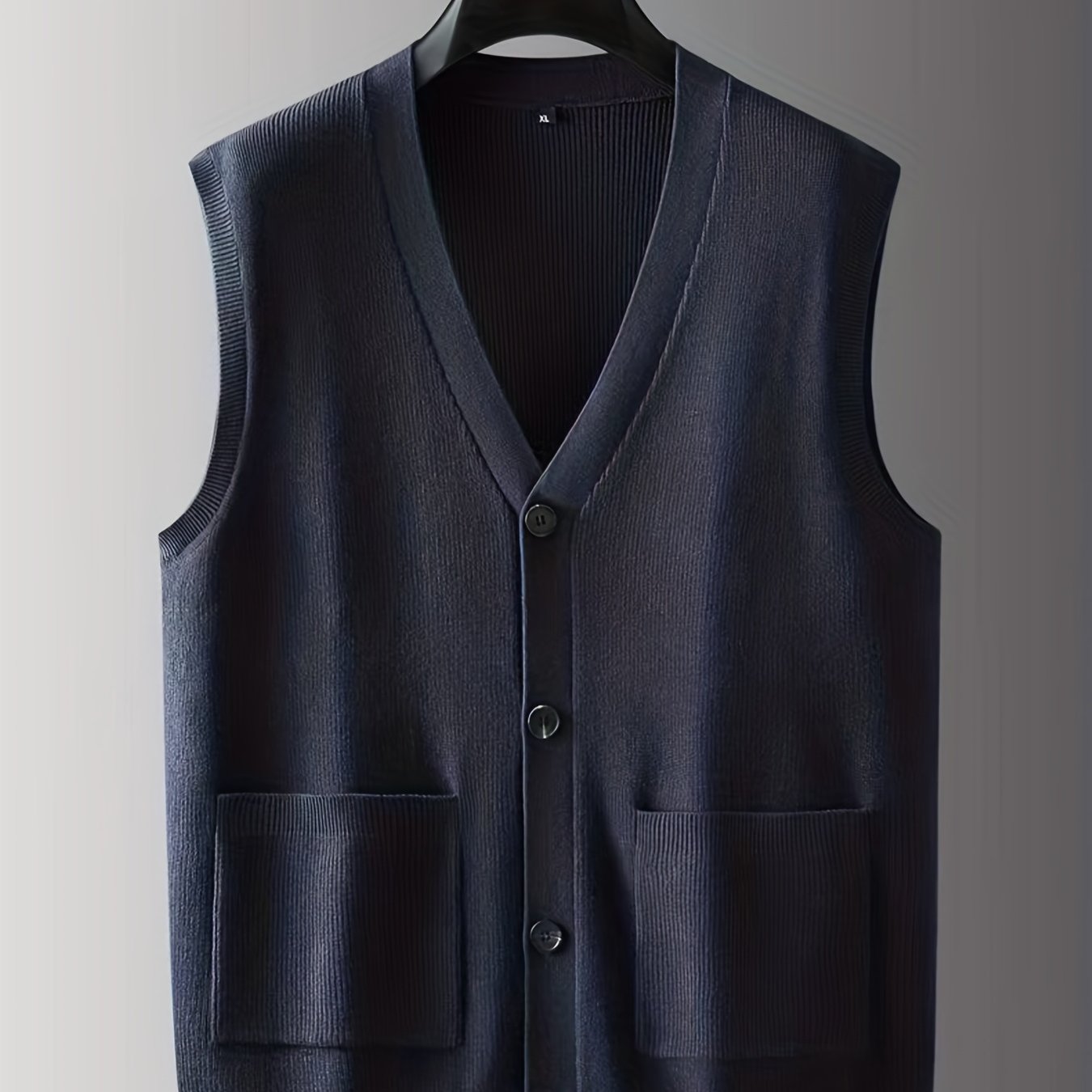 Men's oversized knitted sweater featuring a new cardigan vest design for autumn and winter.