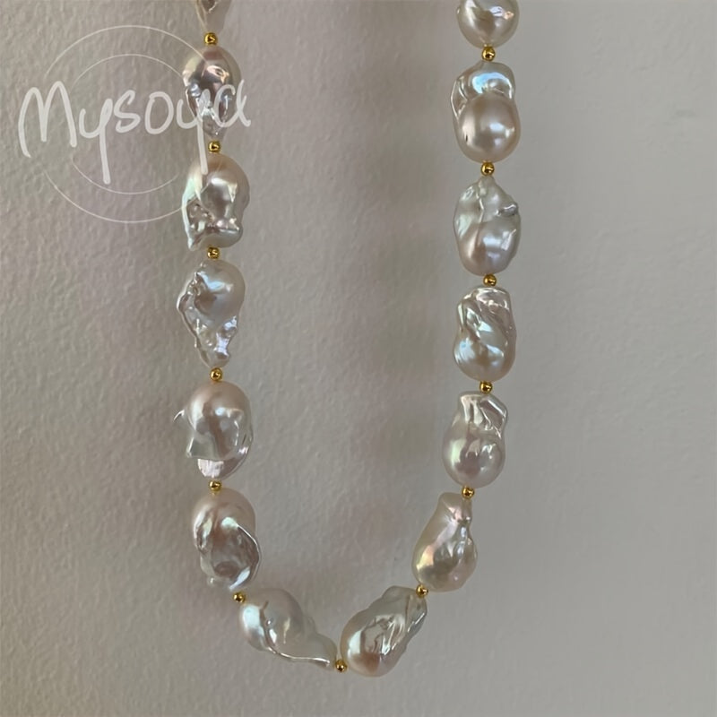 This elegant and unique baroque freshwater pearl necklace from MYSOYA Brand is the perfect accessory for any occasion. With pearls ranging from 14-23mm in size, this handmade boho necklace is a stunning choice for a party, wedding, anniversary, or as a