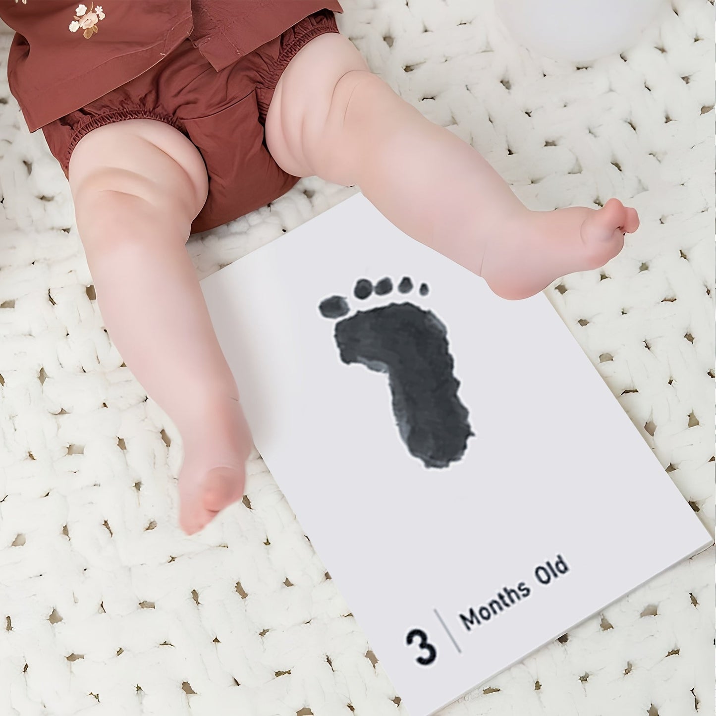 Footprint & Handprint Milestone Kit with 14 Pieces, from AI BEI PARENT CO. Includes Safe Non-Toxic Ink Pads, Print Paper Set for Memory Keepsake Craft. Comes with 14 Ink Pads and 14 Papers, suitable for babies up to 12 months old.