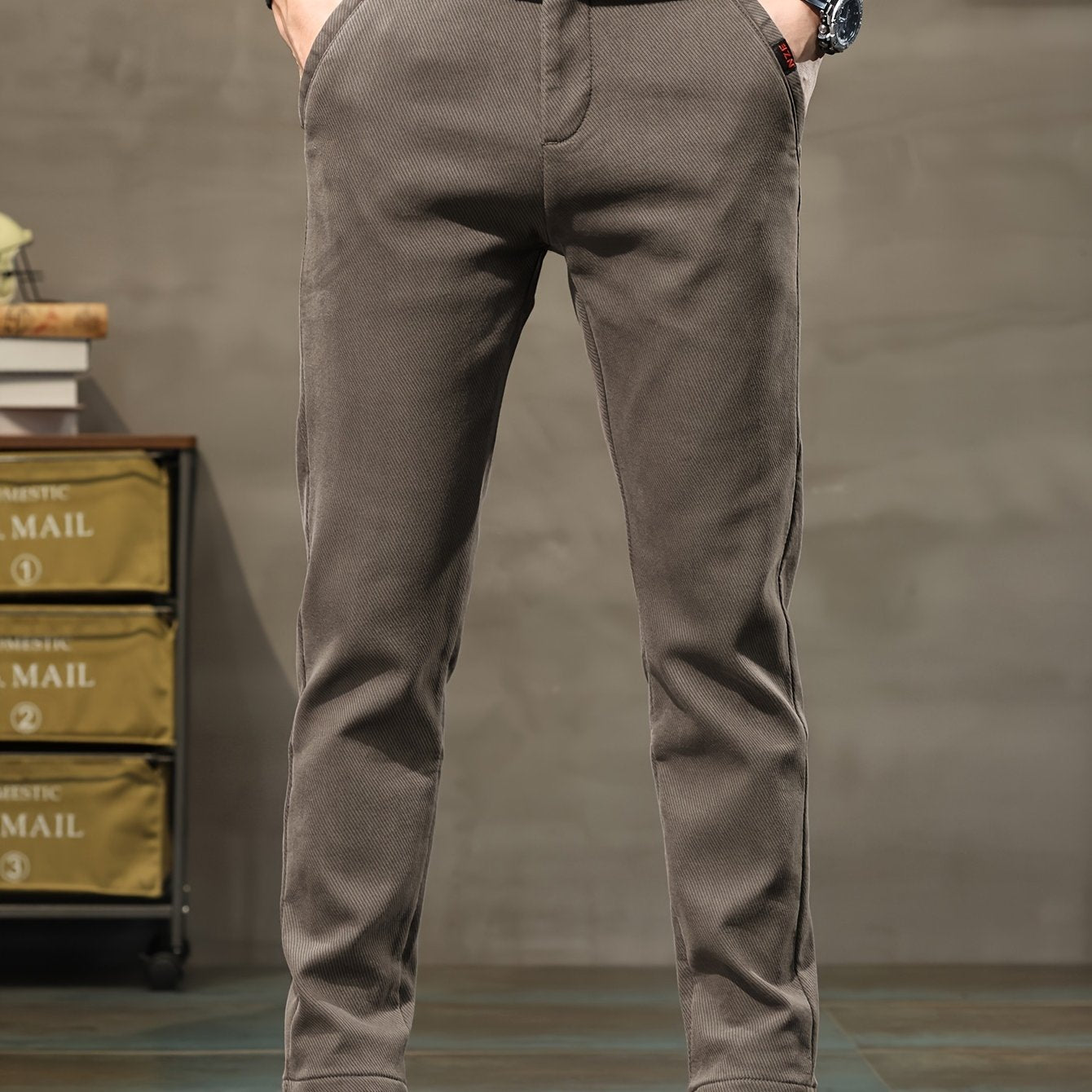 New men's casual pants by a sports brand, perfect for spring and autumn 2023.