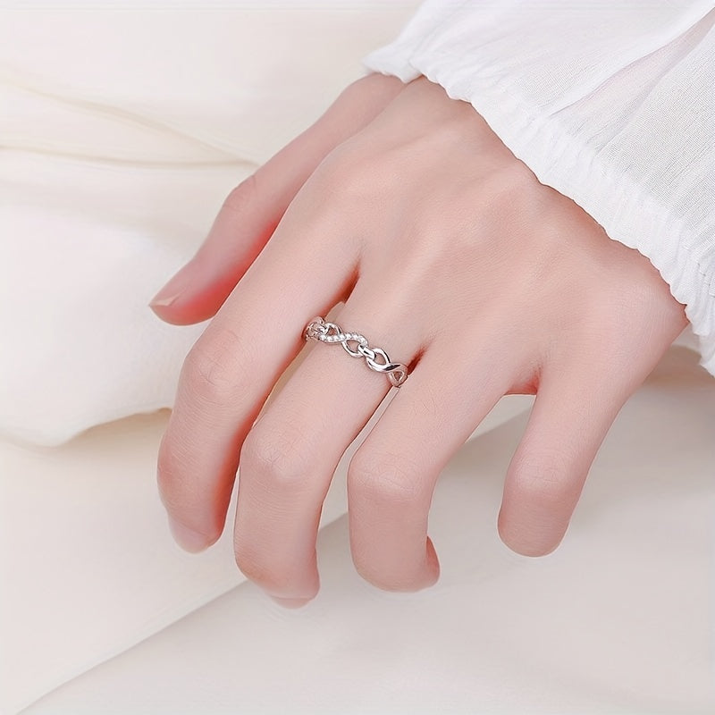 Elegant 925 Sterling Silver Ring featuring an Infinity Design and Sparkling Zirconia Stones, perfect for complementing any outfit. This high-quality piece of jewelry is a beautiful and delicate birthday gift option for women.