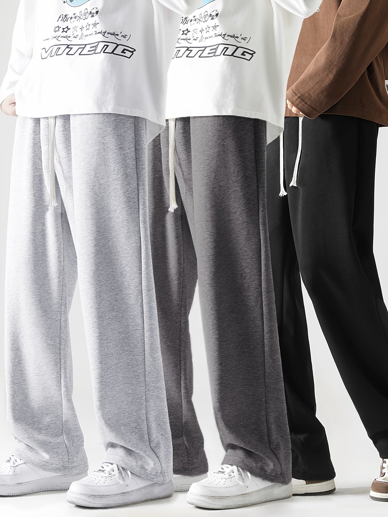 Men's loose straight-leg long pants in solid colors, perfect for spring and autumn fitness activities. Made from soft, slightly stretchy knitted fabric with a drawstring waist. Suitable for