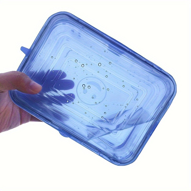 Keep your food fresh with this set of 6 reusable silicone food covers. These square, stretchable, and dishwasher safe lids are perfect for bowls, plates, and containers. Say goodbye to wasteful plastic wrap and keep your fruits and vegetables fresh with