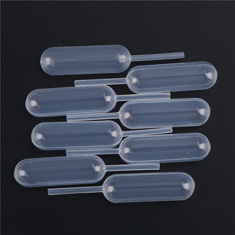 100 round plastic squeeze bottles, each with a 4ML transfer pipette for cupcake decorating. Hand wash only. Does not contain BPS material.